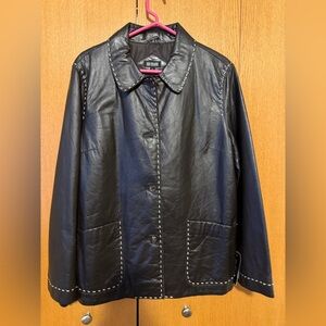 Elegant Black Leather Jacket with White Accents